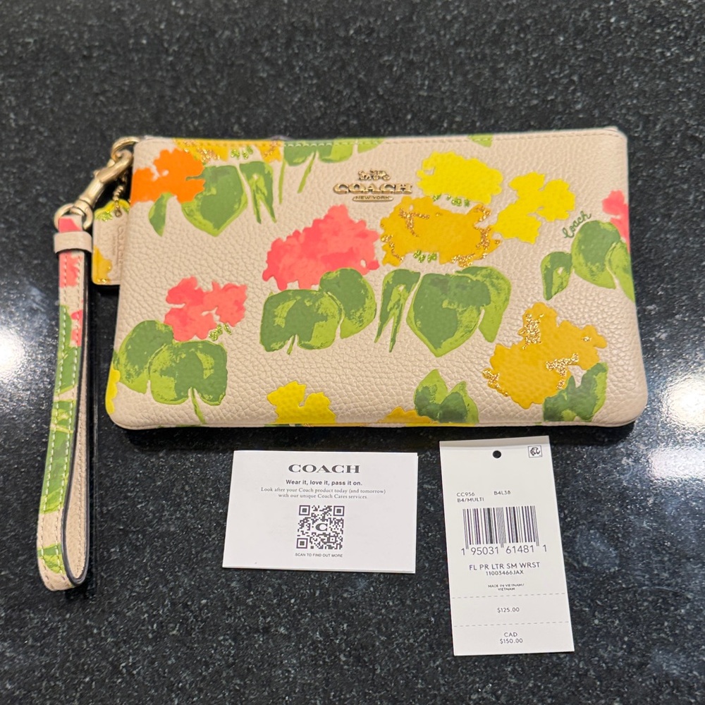 Coach Tan/Floral Leather Wristlet in Cream, Green, and Yellow